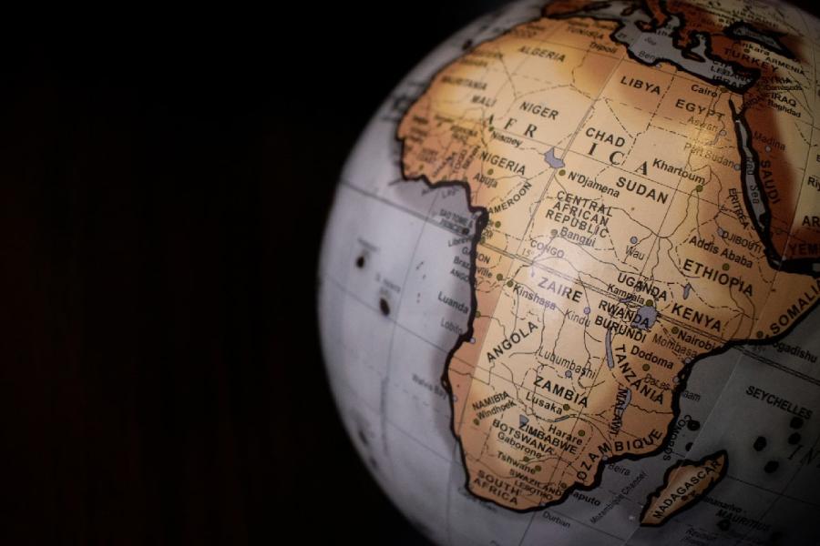 Africa highlighted on a world globe (Credit: James Wiseman, Unsplash)